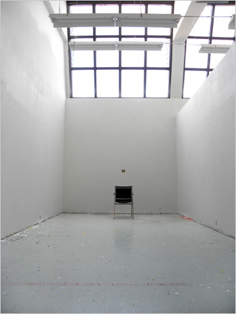 chair and skylight in studio